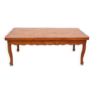 Grande table en bois massif avec rallonges intégrées