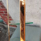 Wall shelf in gilded metal and glass/1980s