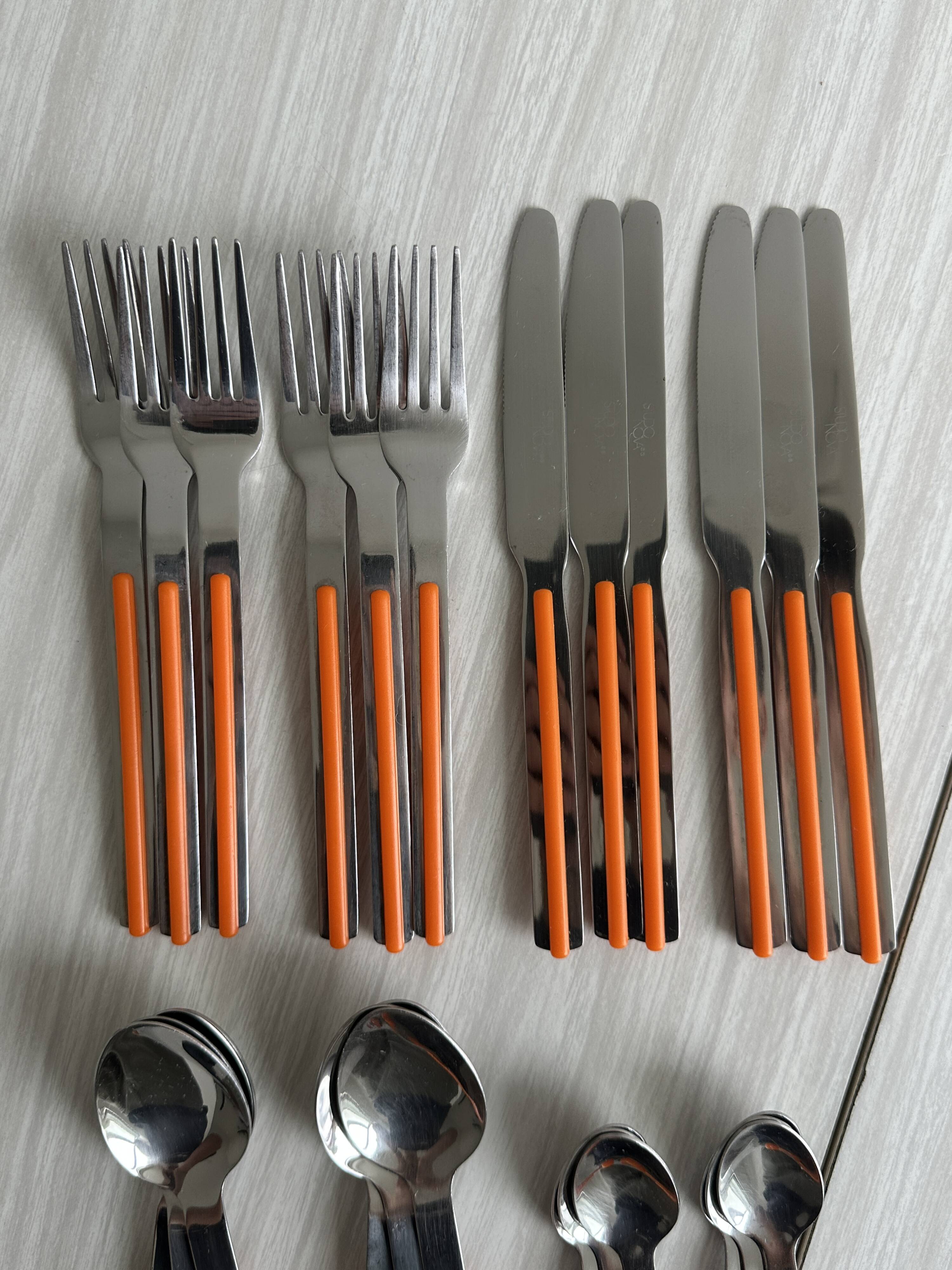 24 vintage stainless steel and orange plastic cutlery sets