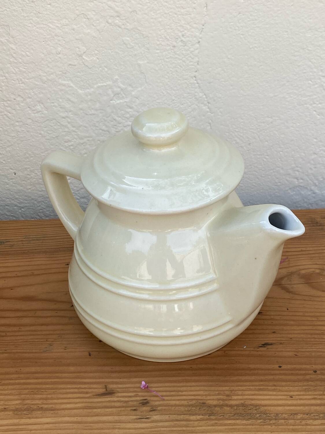 White ceramic teapot