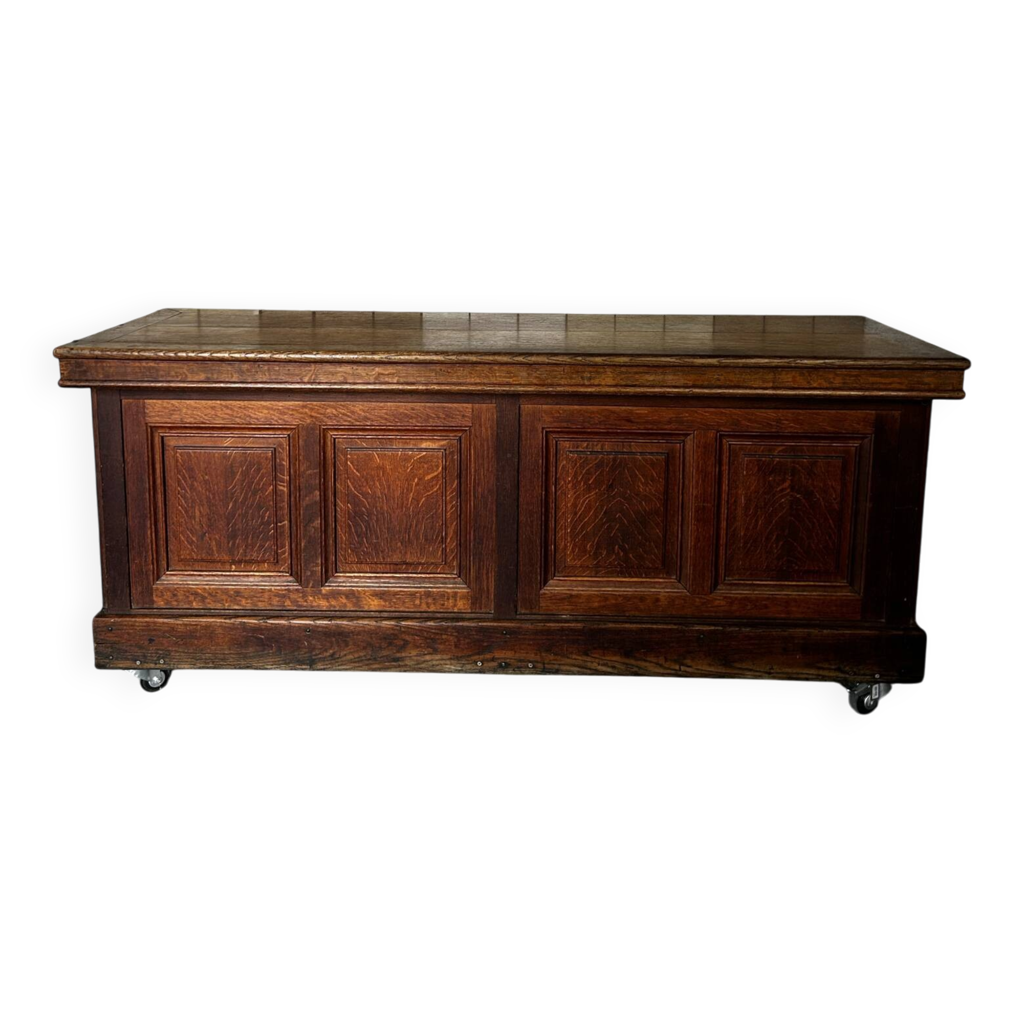 Large antique haberdashery counter in oak