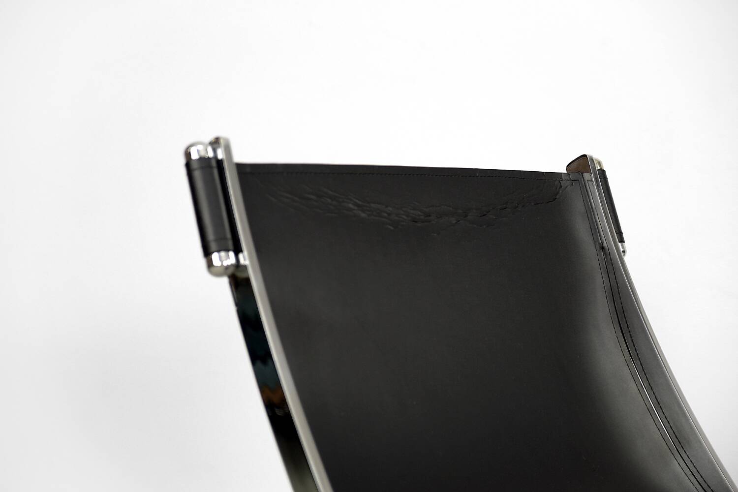 Vintage minimalist chair in Italian leather, 1980s.