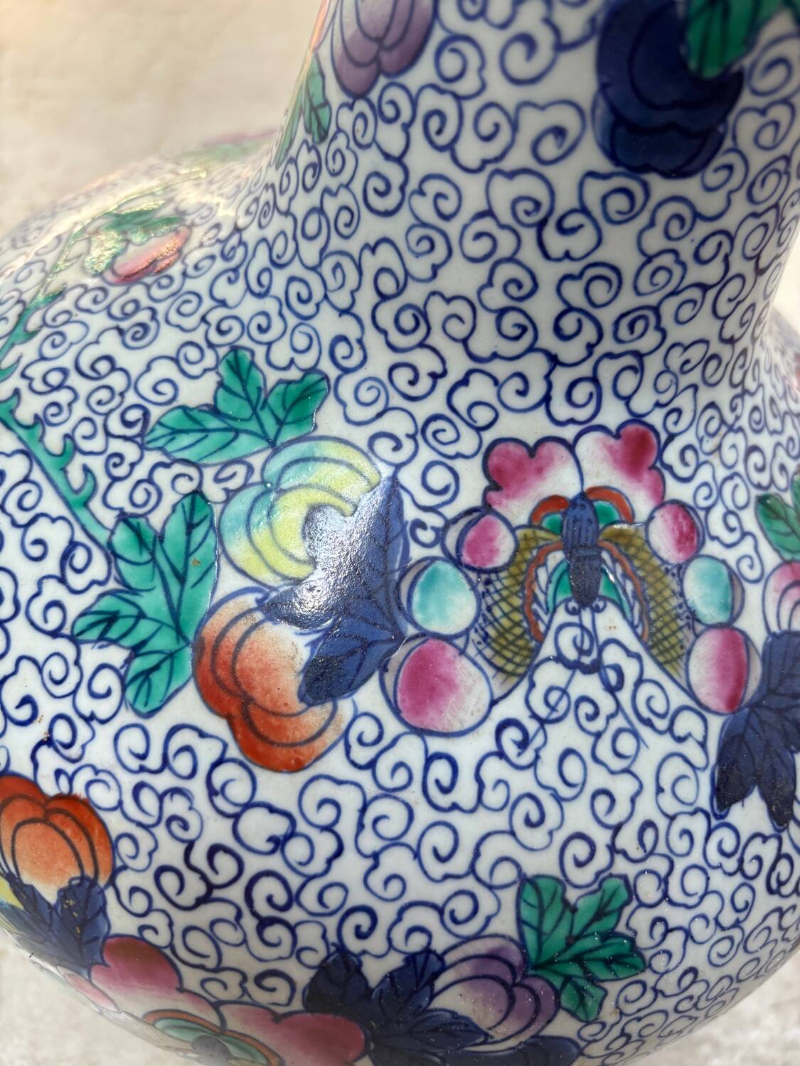 CHINA Polychrome porcelain vase decorated with butterflies Signed under the base 43cm