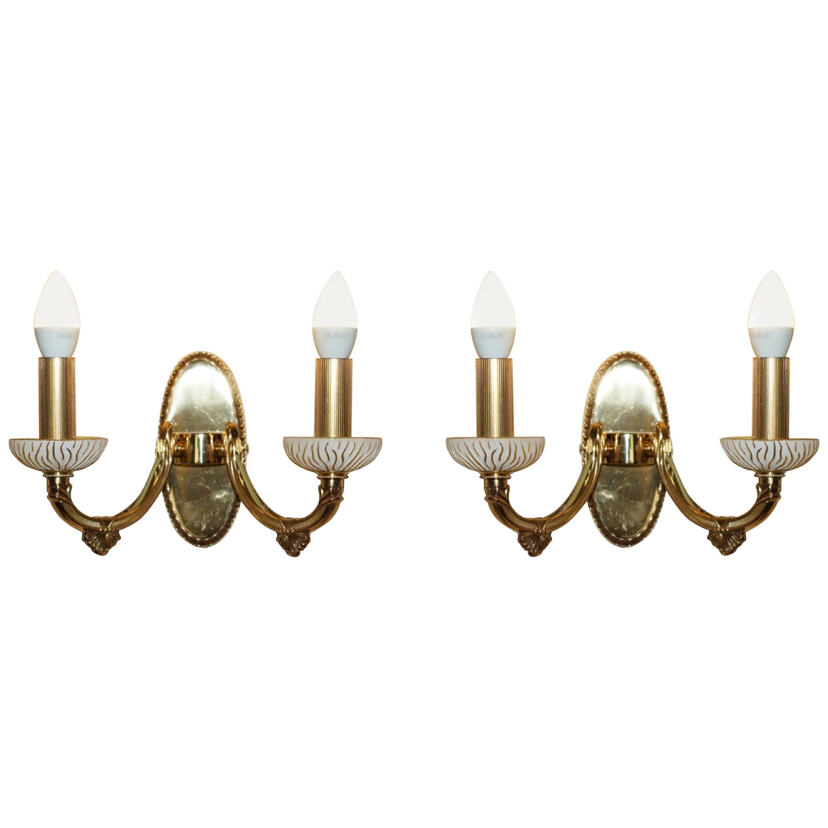 Reccagni wall light pair in brass and frosted glass.