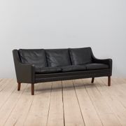 Danish black leather and rosewood sofa