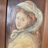 Old oil portrait on wood of a young woman