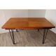 Vintage extendable dining table in wood and metal base, 1950