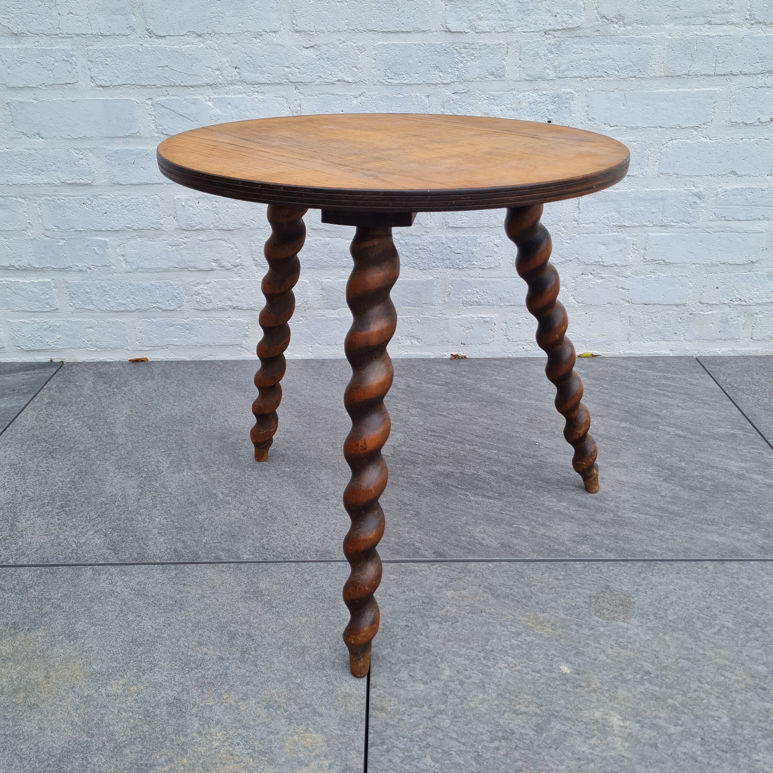 Wooden coffee table twisted tripod base