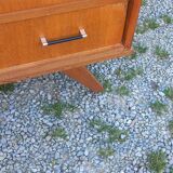 Vintage oak commode with tapered legs and wings from the 1950s.