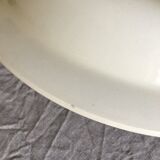 Round hollow earthenware dish