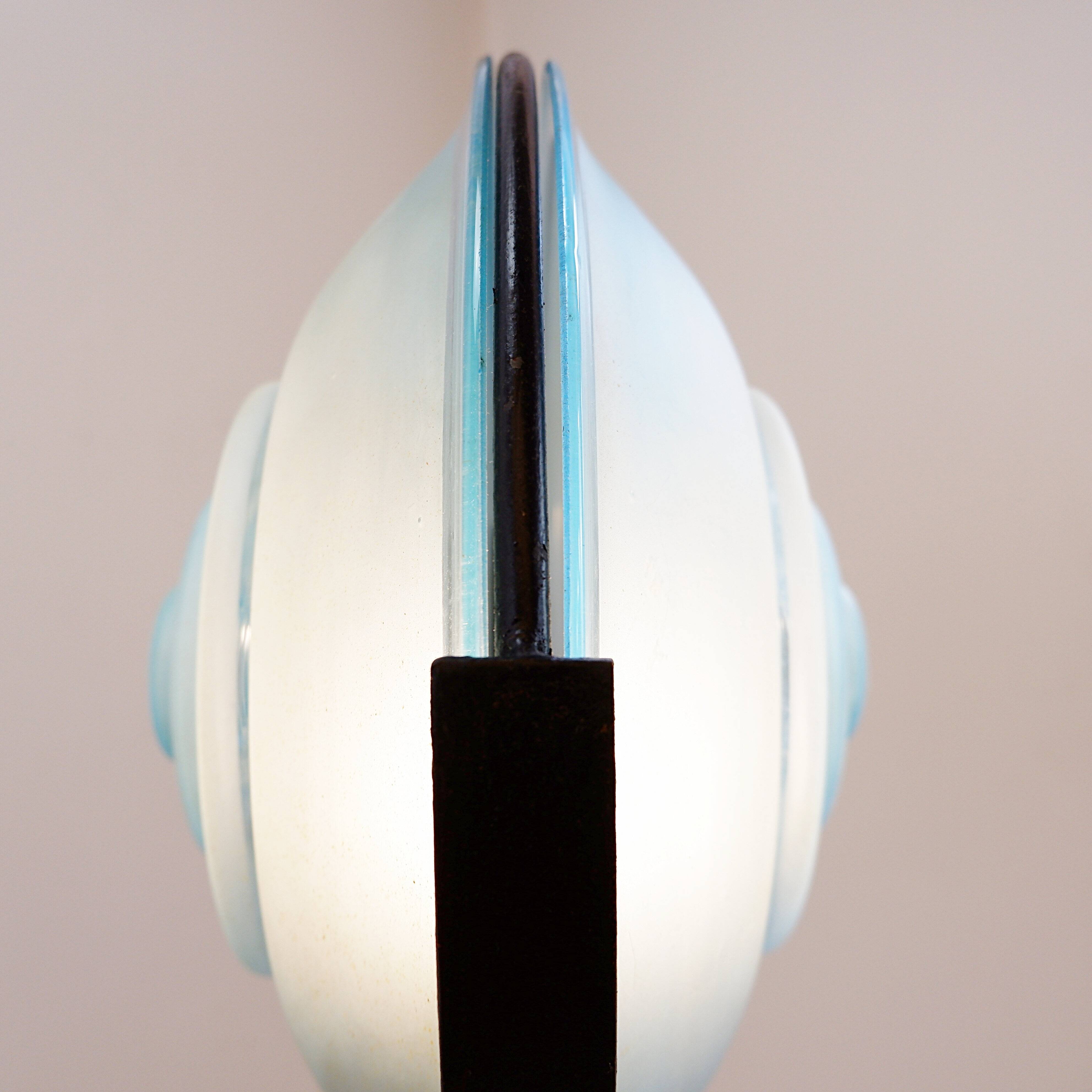Floor lamp in metal and sandblasted glass disc