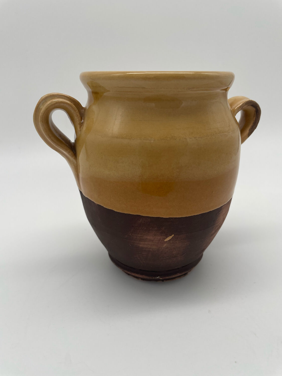 Varnished yellow terracotta confit pot