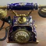 Téléphone de maison en porcelaine doré début XXeme