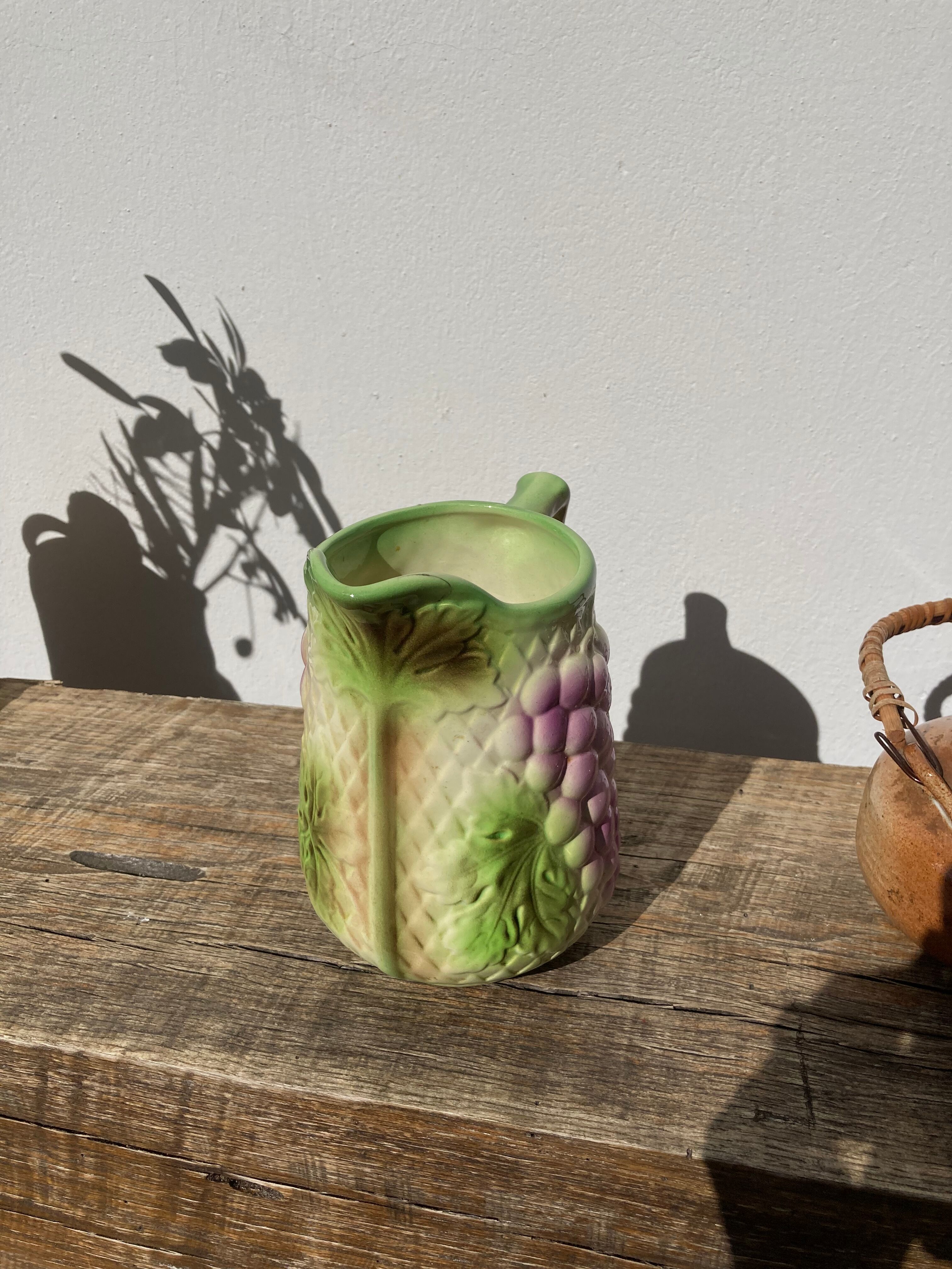 Pitcher in slip - earthenware Saint Clement numbered with fruit and grape basket decoration