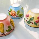 3 slip style bowls signed GV - Cherry, pear and peach patterns.