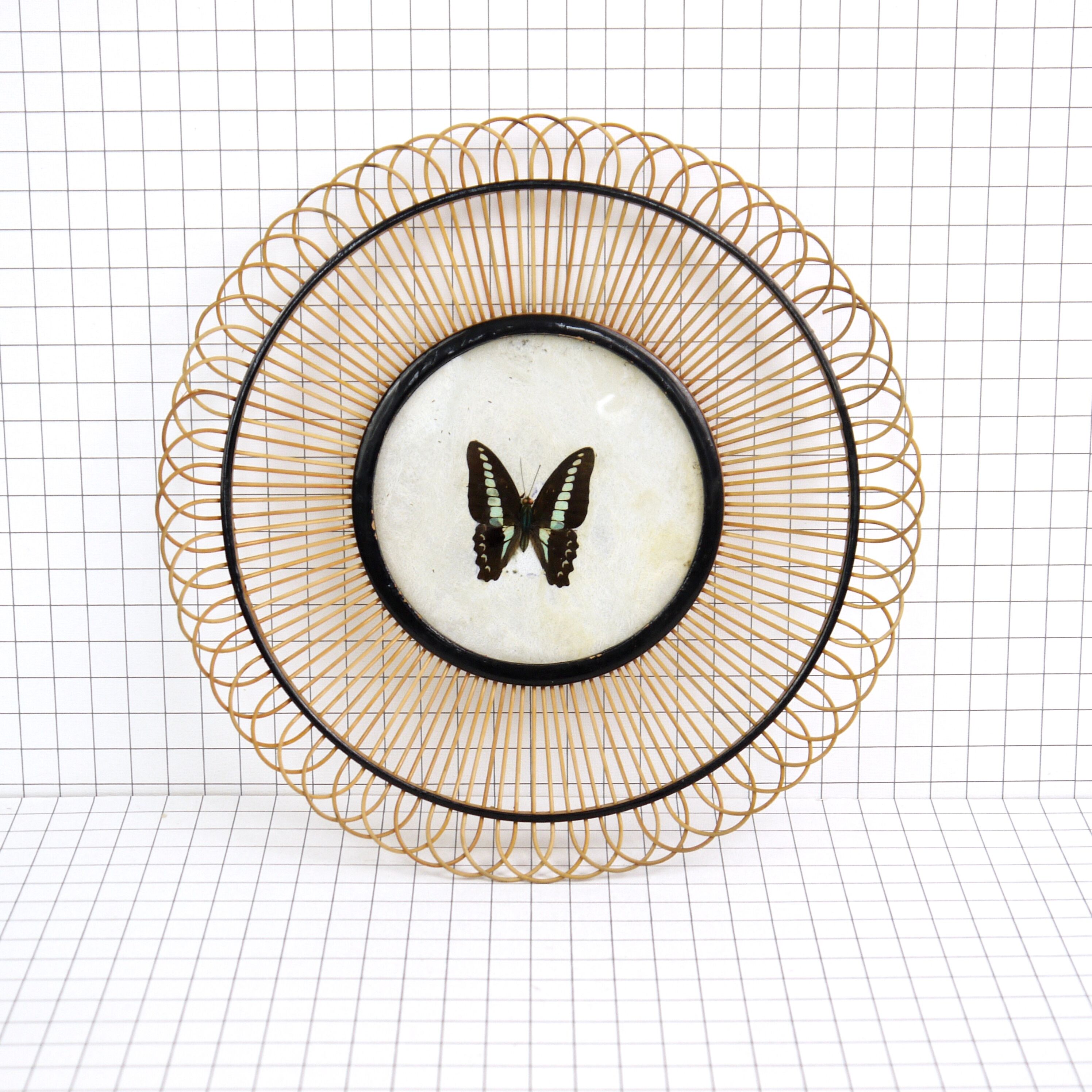 Wicker fruit basket with butterfly