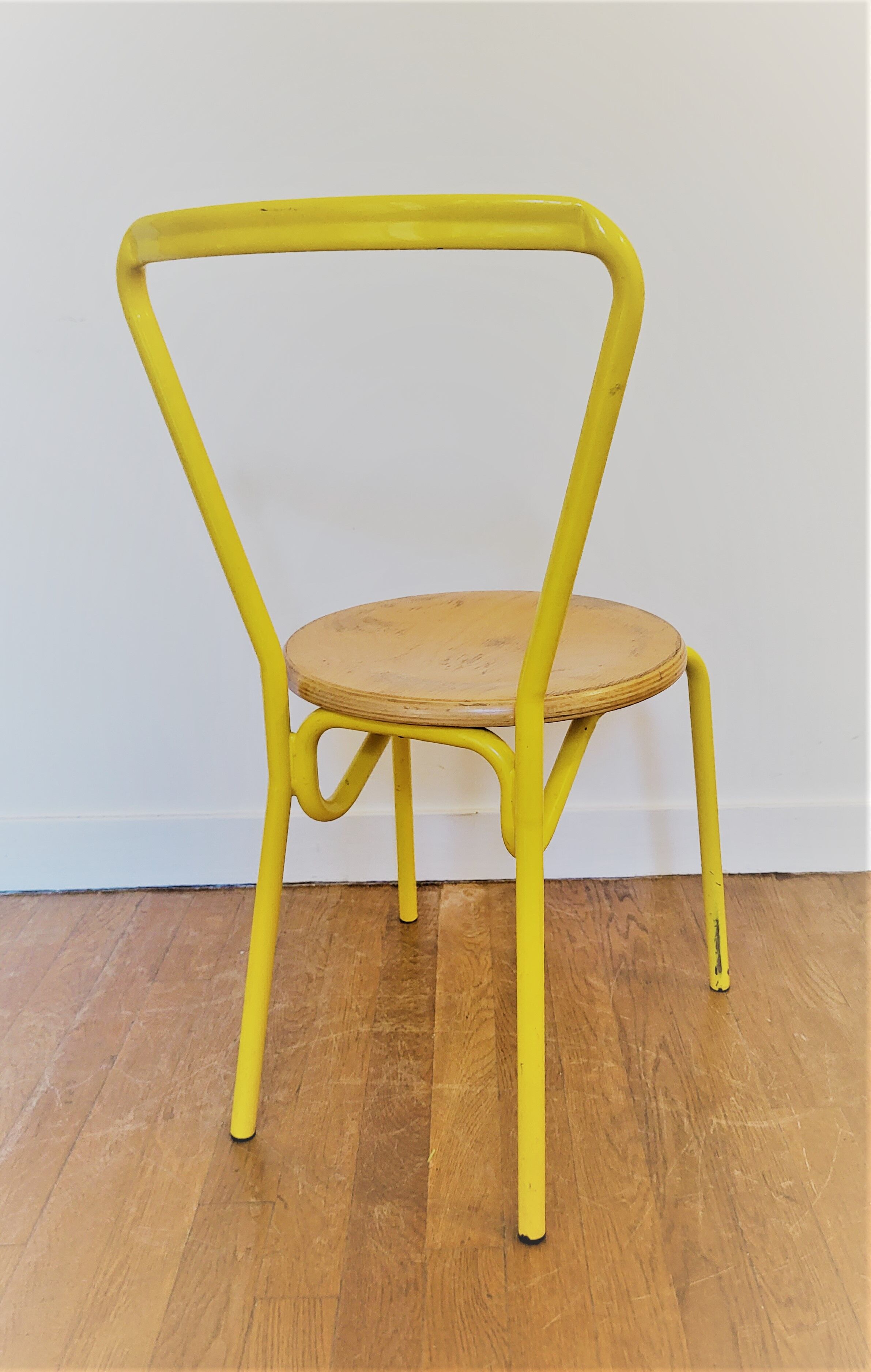 Vintage yellow school chairs from the 90s