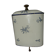 Old wall fountain in enamelled sheet metal decorated with blue flowers on a white background