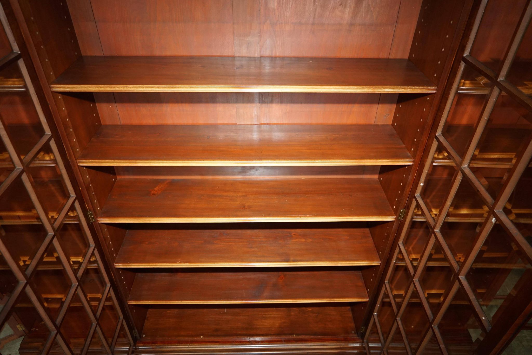 Monumental glass library in Victorian hardwood.