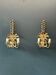 Pair of gold wall lights