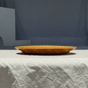 Antique oval dish, yellow-orange, frieze border L:24