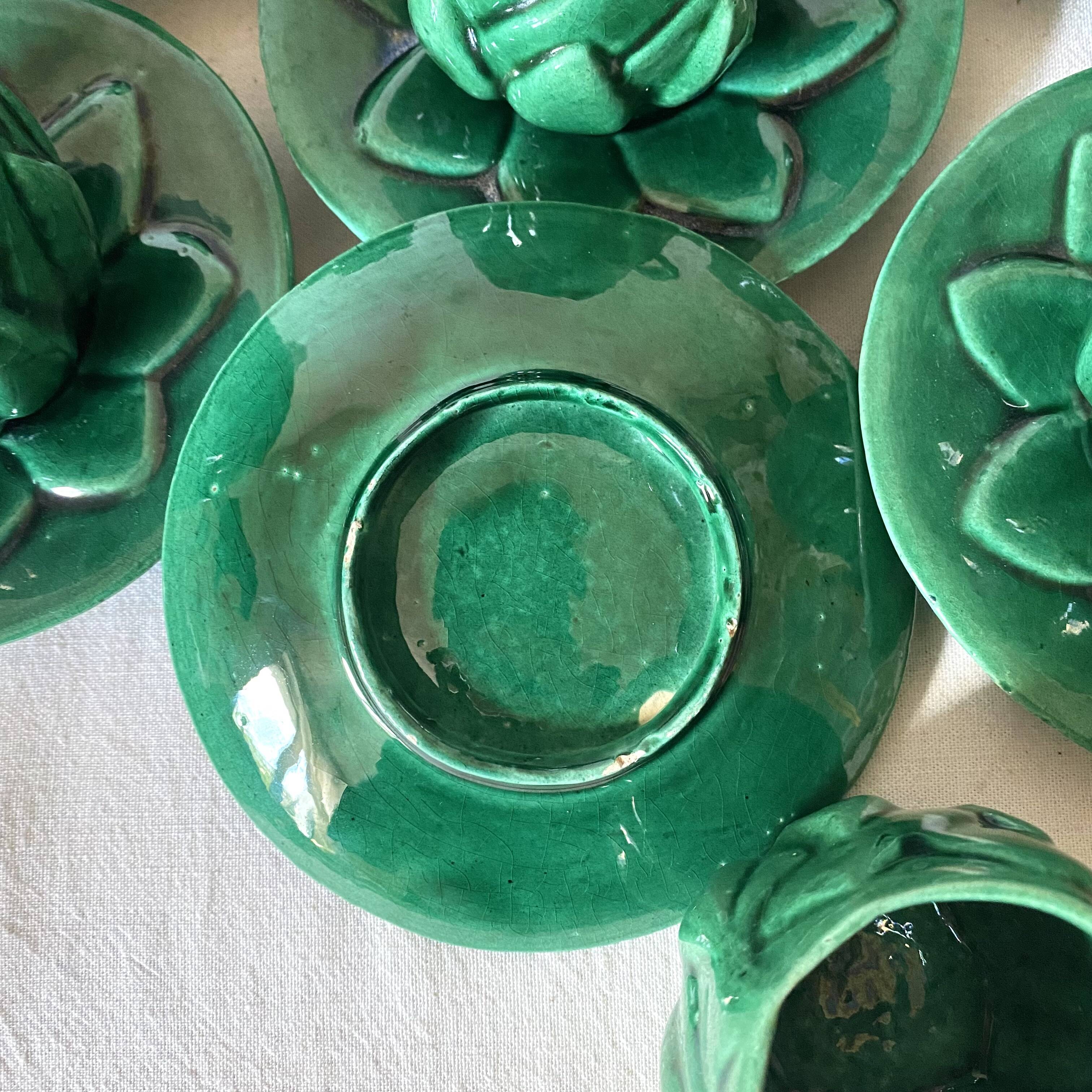 Antique slip cups with saucers, sugar bowl and milk pitcher