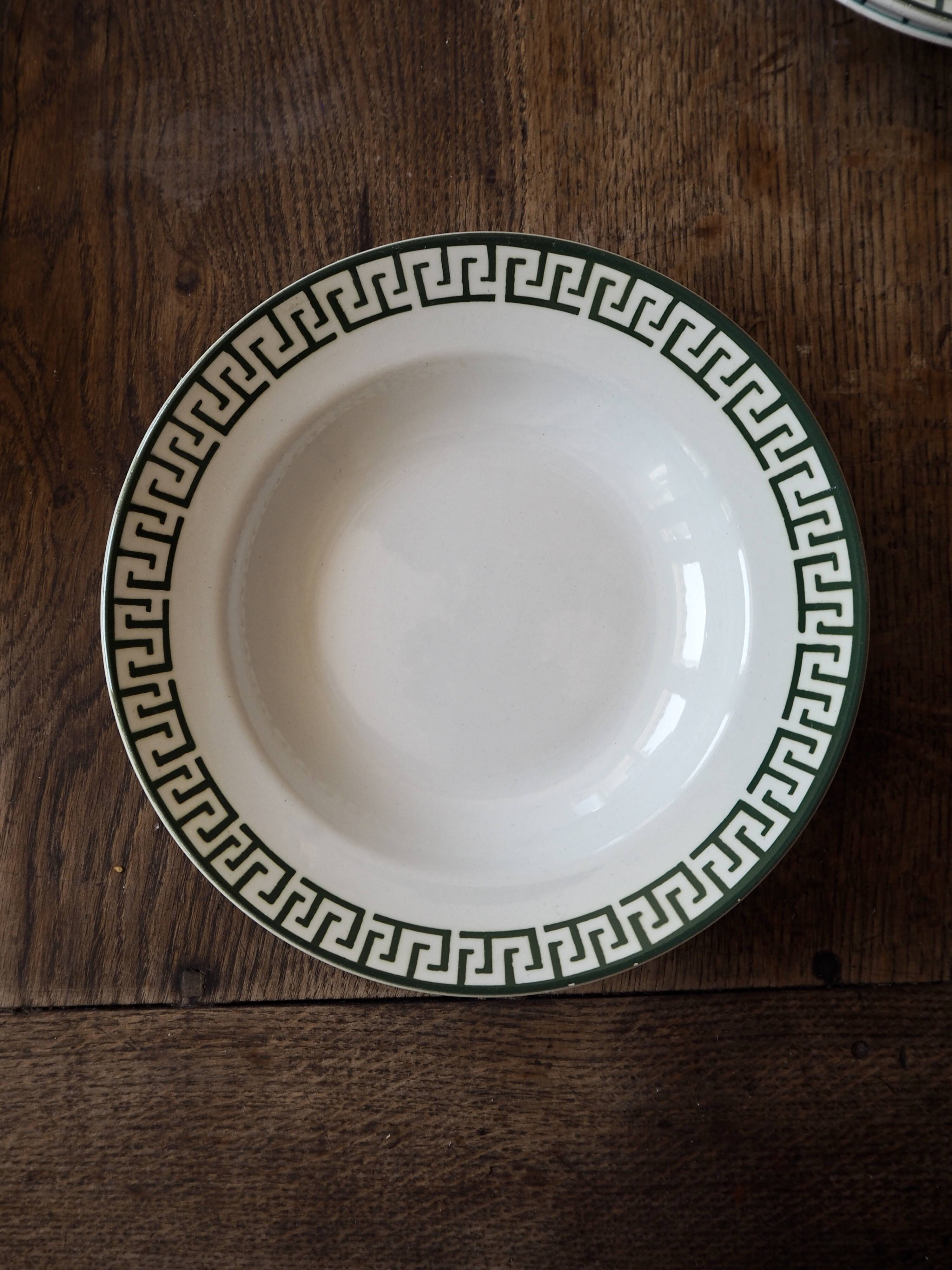 Set of 12 green patterned soup plates, Badonviller earthenware