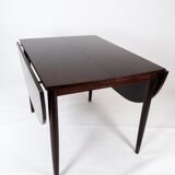 Dining table in rosewood with extensions designed by Arne Vodder from the 1960