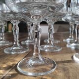 Set of 12 vintage glass champagne glasses with curved foot