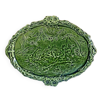 Green slurry dish decorated with Indians