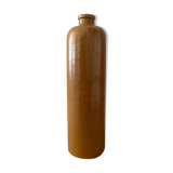 Old stoneware bottle with logo