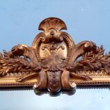 Large mirror XIX th in wood and gilded stucco Louis XVI style