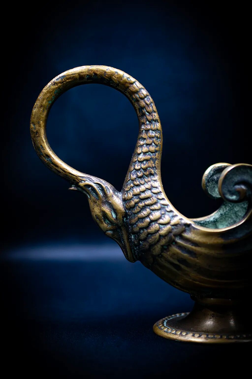 Bronze patinated pocket emptier with swan decoration by Max Le Verrier.