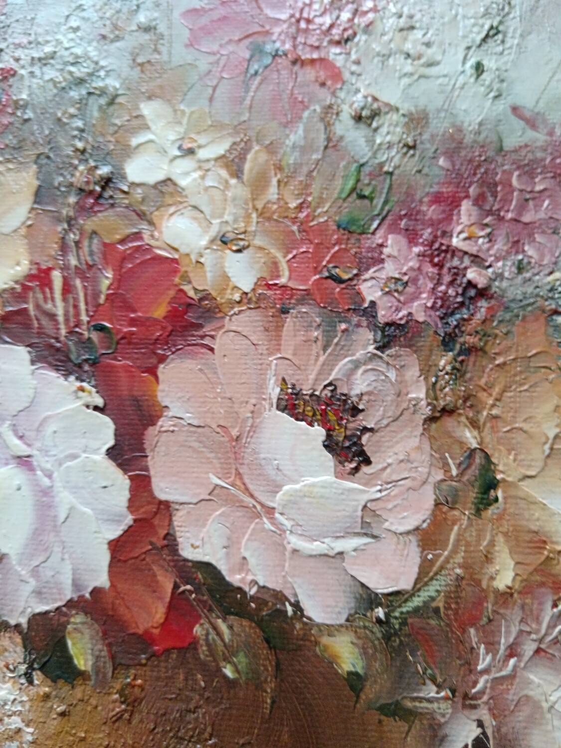 Oil of a bouquet and its lovely frame