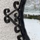 Vintage 1950s round metal mirror in the style of Chaty