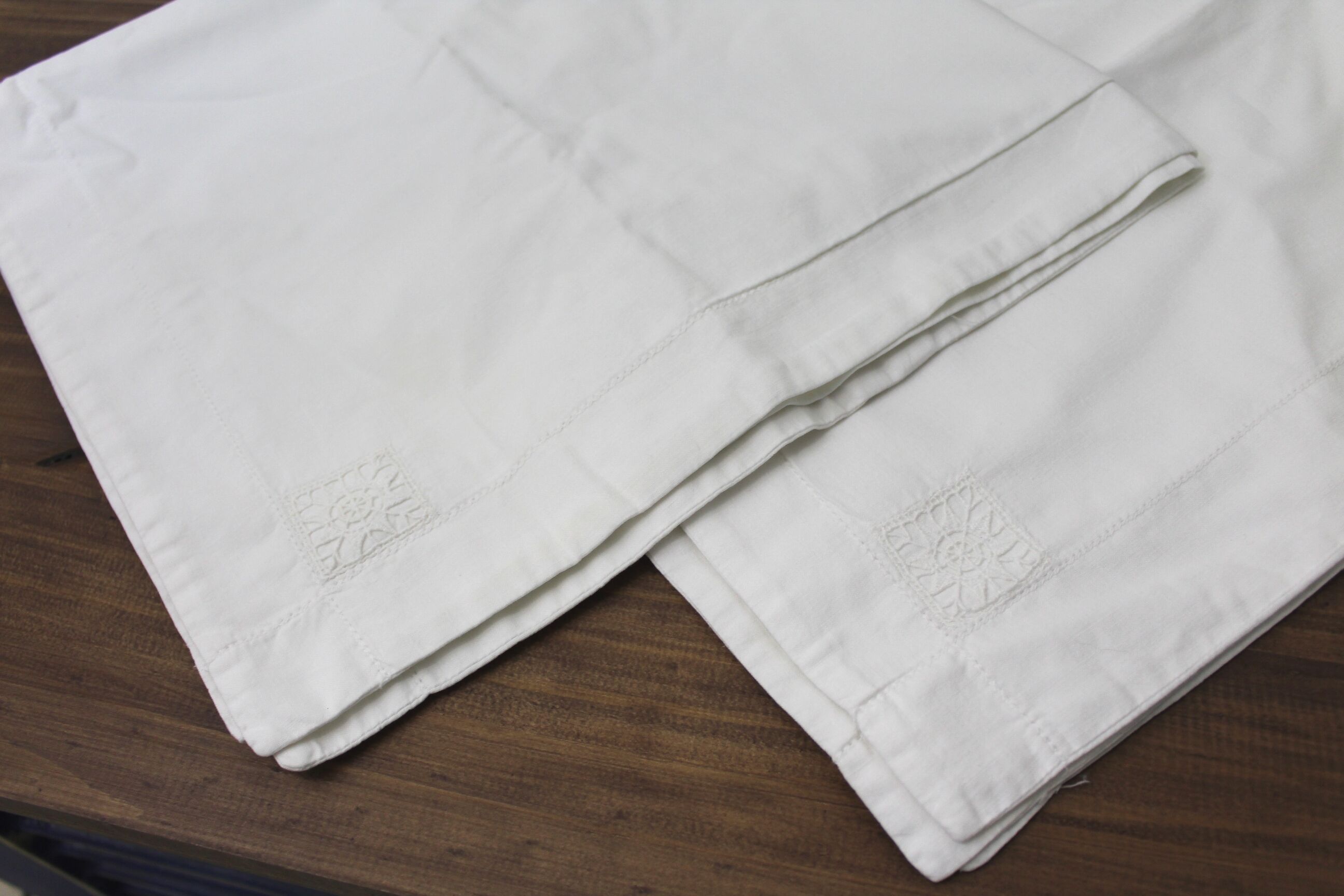 Pair of white cotton pillowcases