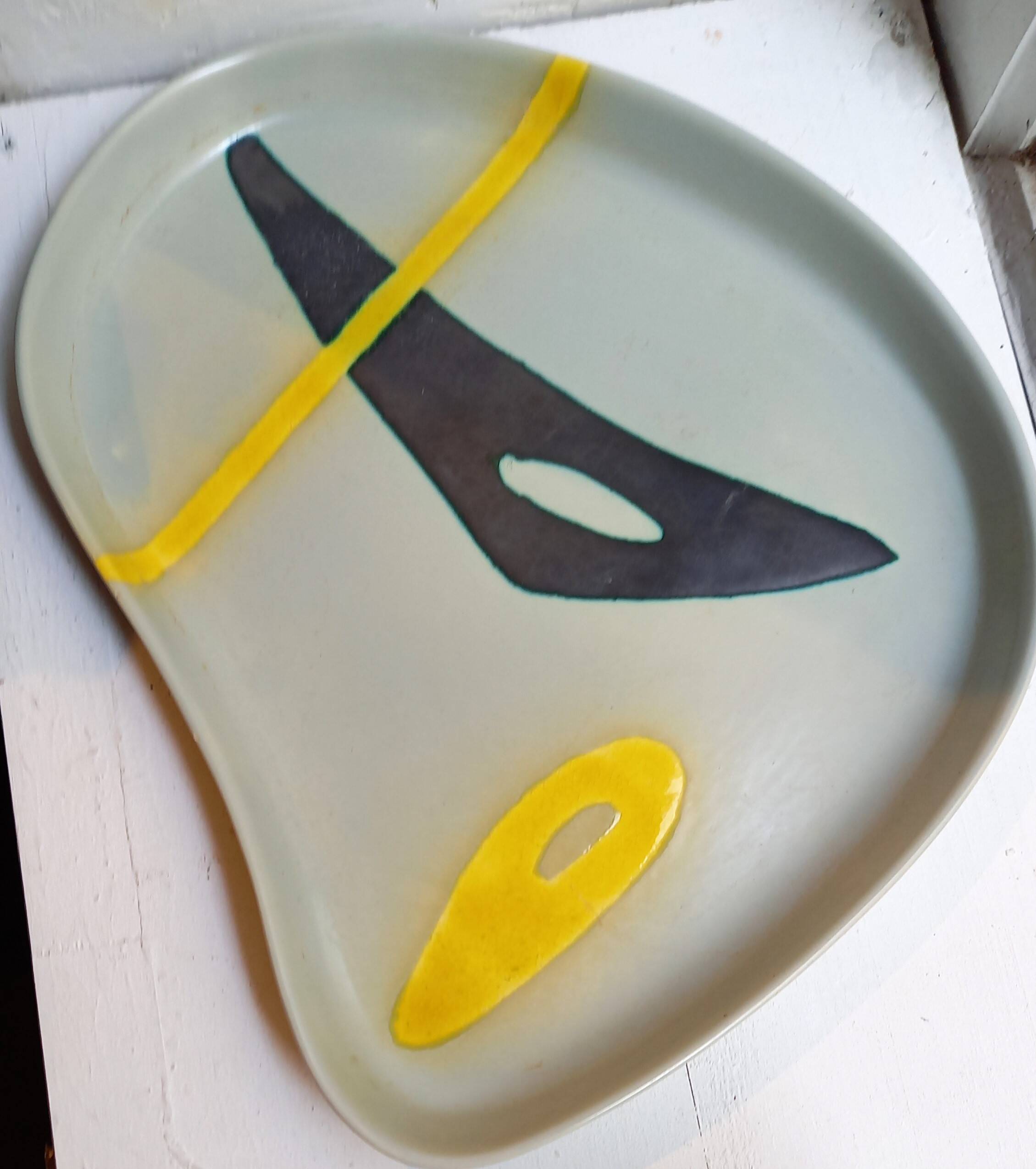 Ceramic dish by Peter Orlando, free form with abstract decoration, 1950s
