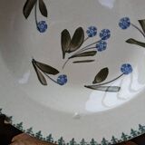 Old deep iron earth plate with blue flower pattern