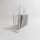 Vintage chrome metal magazine rack - Space Age design from the 1970s - Decorative storage for magazines and books - Elegant retro gift idea