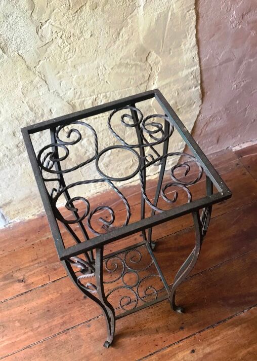 Wrought iron plant holder shelf