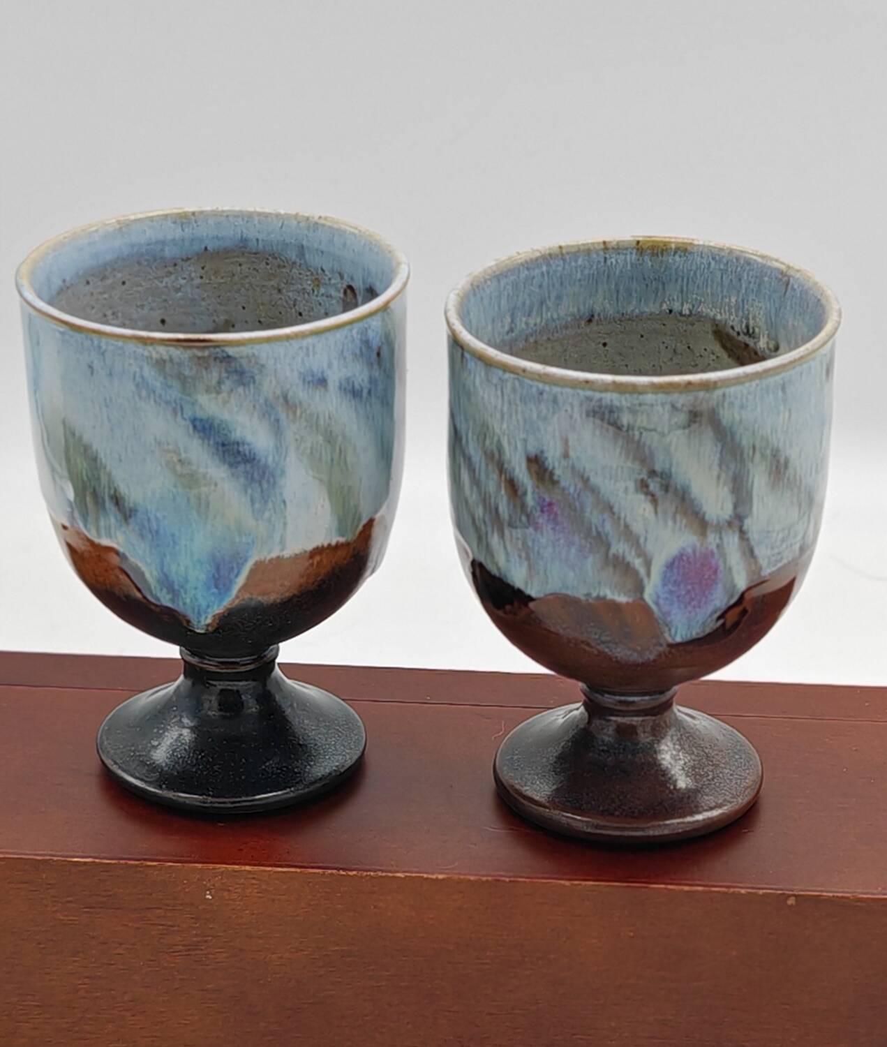 Pair of enameled stoneware mazagrans by Jean Claude Séris
