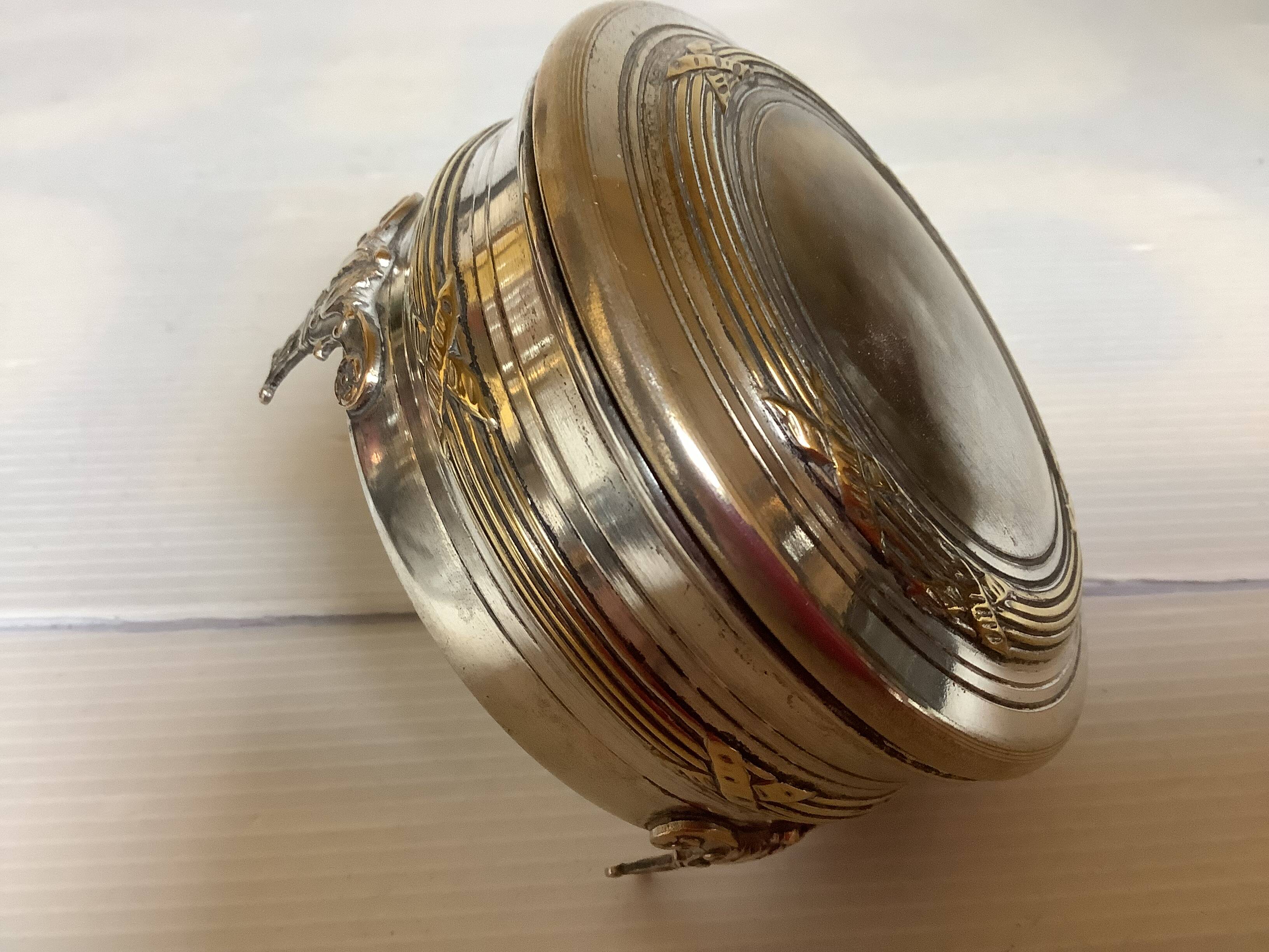 Antique silver-plated tripod box in the Louis XVI style.