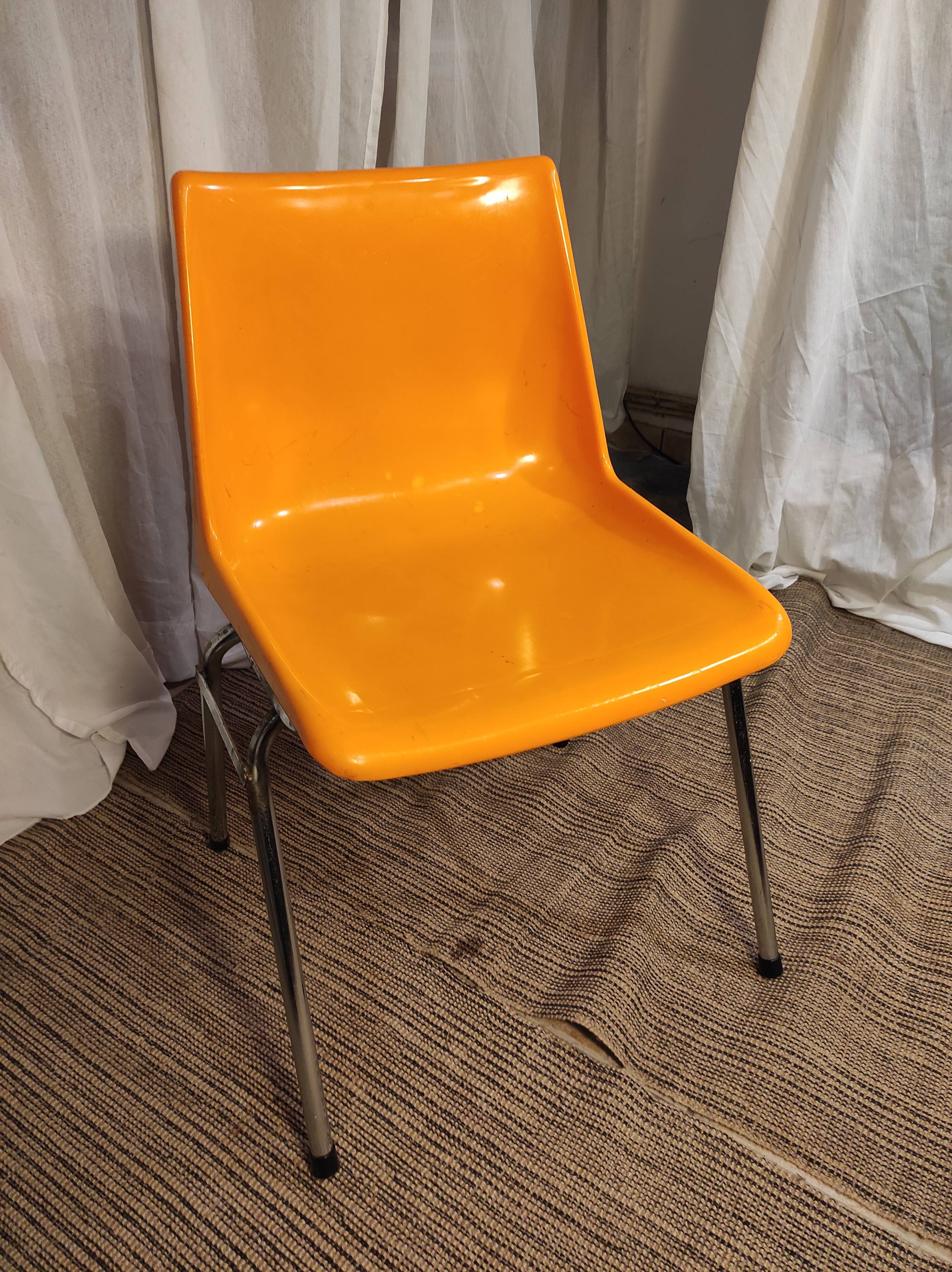 Orange plastic chair 1970