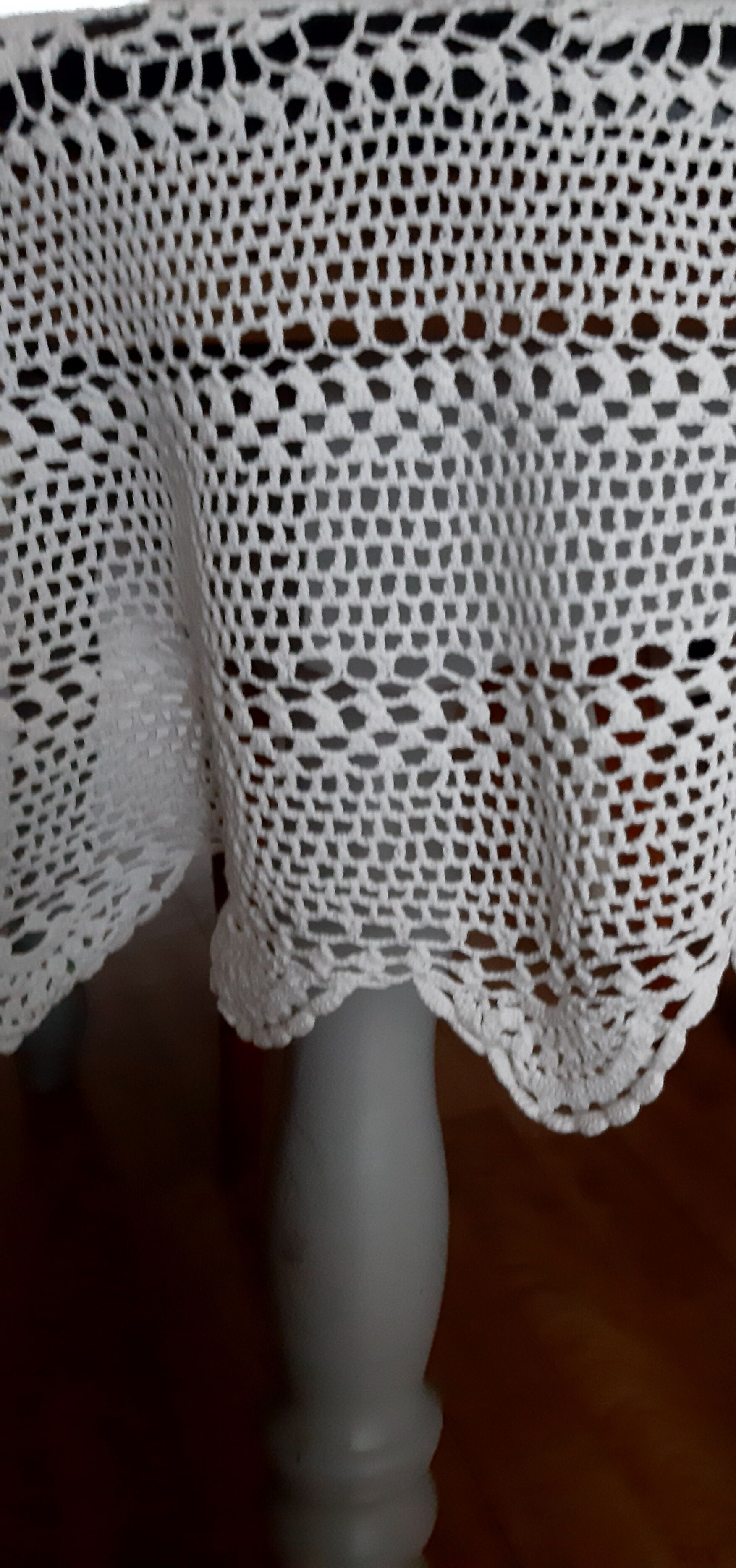 Old crocheted round tablecloth