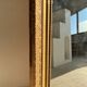 Gilded mirror with frieze h2m10 l:73cm