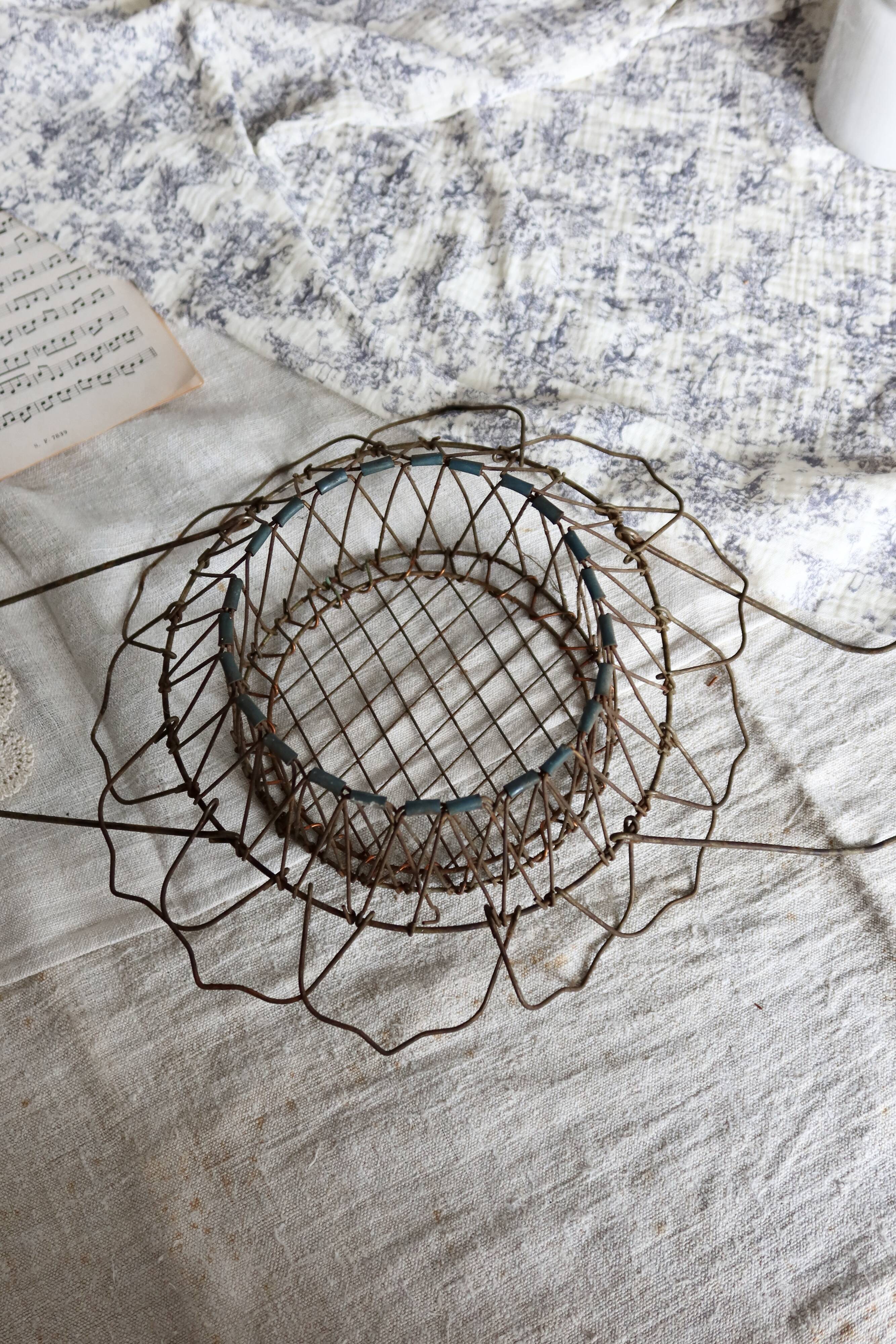 Vintage foldable metal basket in the shape of a flower