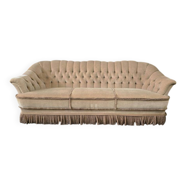 Canapé vintage beige avec franges