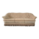Canapé vintage beige avec franges