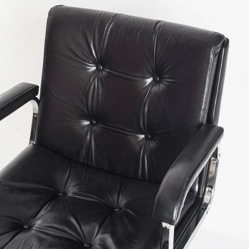 Vintage leather armchair. Swivel, on casters, multi-position. Norway, 1970s.