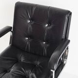 Vintage leather armchair. Swivel, on casters, multi-position. Norway, 1970s.